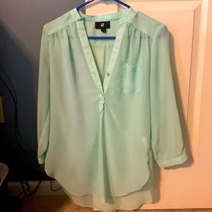 Mint green three quarter length V neck top